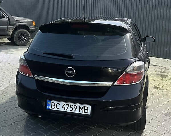 Черный Опель Астра, объемом двигателя 1.8 л и пробегом 300 тыс. км за 5600 $, фото 2 на Automoto.ua