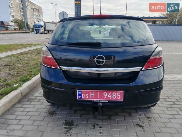Черный Опель Астра, объемом двигателя 1.6 л и пробегом 194 тыс. км за 5000 $, фото 7 на Automoto.ua