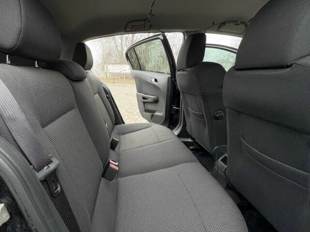 Черный Опель Астра, объемом двигателя 1.6 л и пробегом 246 тыс. км за 5650 $, фото 21 на Automoto.ua