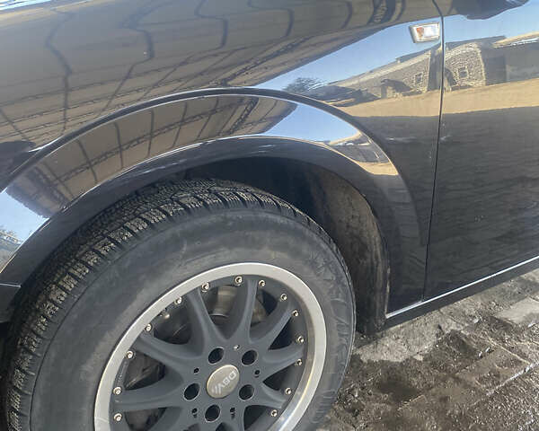 Черный Опель Астра, объемом двигателя 1.6 л и пробегом 209 тыс. км за 5500 $, фото 6 на Automoto.ua