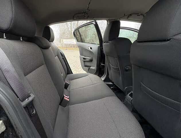 Черный Опель Астра, объемом двигателя 1.6 л и пробегом 245 тыс. км за 5650 $, фото 22 на Automoto.ua