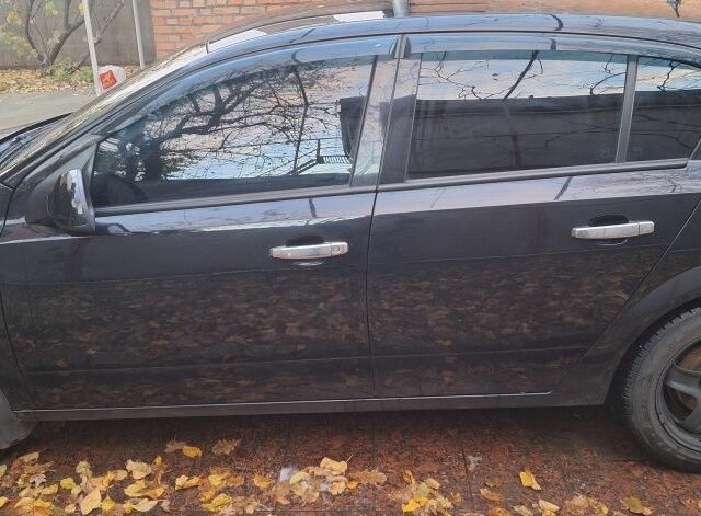 Черный Опель Астра, объемом двигателя 1.4 л и пробегом 173 тыс. км за 5500 $, фото 4 на Automoto.ua