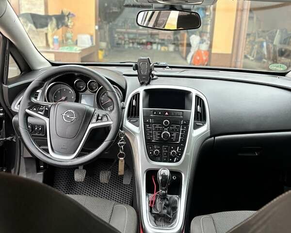 Черный Опель Астра, объемом двигателя 1.69 л и пробегом 235 тыс. км за 6500 $, фото 5 на Automoto.ua