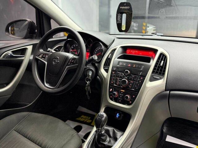 Черный Опель Астра, объемом двигателя 1.6 л и пробегом 180 тыс. км за 7700 $, фото 16 на Automoto.ua