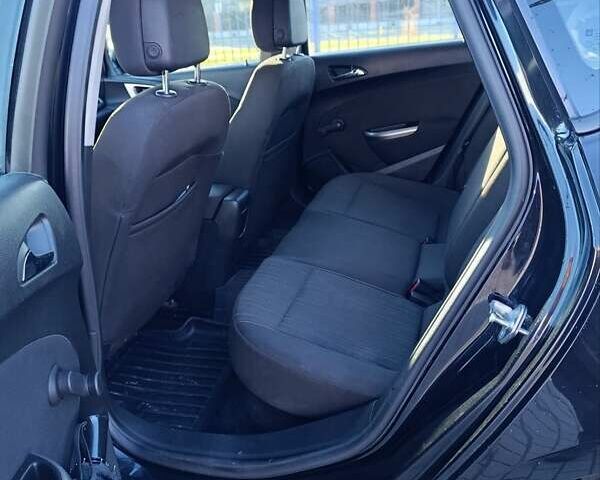 Черный Опель Астра, объемом двигателя 1.6 л и пробегом 249 тыс. км за 6500 $, фото 5 на Automoto.ua