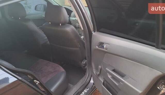 Чорний Опель Астра, об'ємом двигуна 1.4 л та пробігом 173 тис. км за 5500 $, фото 8 на Automoto.ua