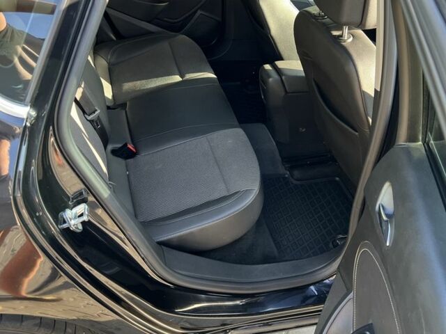 Черный Опель Астра, объемом двигателя 1.2 л и пробегом 300 тыс. км за 7399 $, фото 6 на Automoto.ua