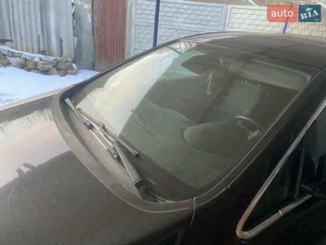 Черный Опель Астра, объемом двигателя 1.36 л и пробегом 210 тыс. км за 6500 $, фото 5 на Automoto.ua