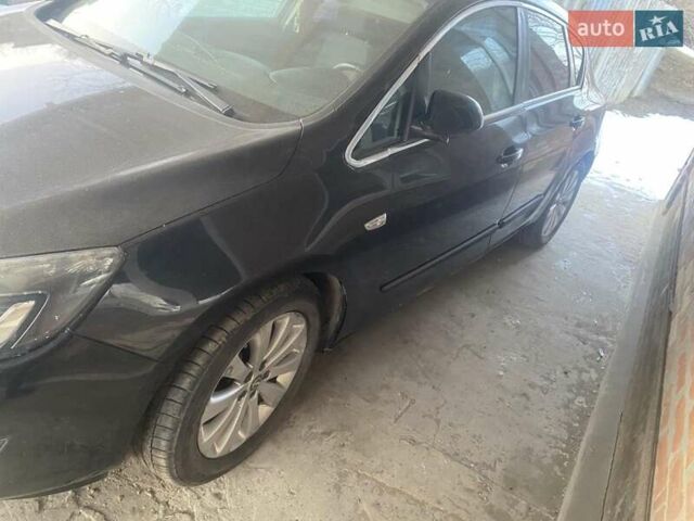 Черный Опель Астра, объемом двигателя 1.36 л и пробегом 210 тыс. км за 6500 $, фото 3 на Automoto.ua