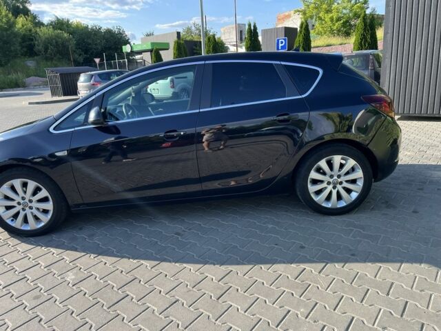 Черный Опель Астра, объемом двигателя 1.2 л и пробегом 300 тыс. км за 7399 $, фото 2 на Automoto.ua