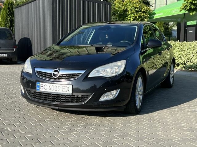 Черный Опель Астра, объемом двигателя 1.2 л и пробегом 300 тыс. км за 7399 $, фото 1 на Automoto.ua