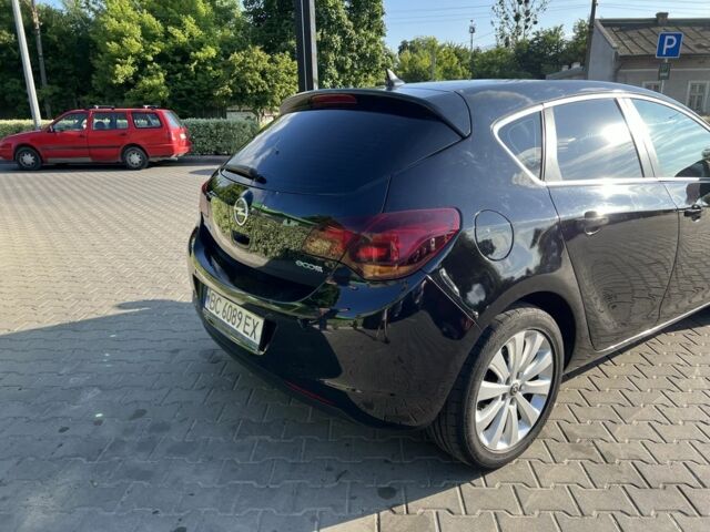 Черный Опель Астра, объемом двигателя 1.2 л и пробегом 300 тыс. км за 7399 $, фото 4 на Automoto.ua