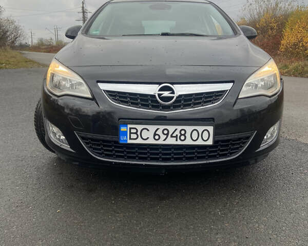 Черный Опель Астра, объемом двигателя 1.4 л и пробегом 155 тыс. км за 6499 $, фото 2 на Automoto.ua