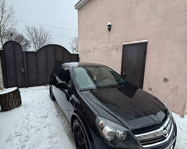 Черный Опель Астра, объемом двигателя 1.4 л и пробегом 218 тыс. км за 5700 $, фото 2 на Automoto.ua