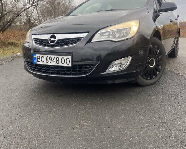 Черный Опель Астра, объемом двигателя 1.4 л и пробегом 155 тыс. км за 6499 $, фото 1 на Automoto.ua