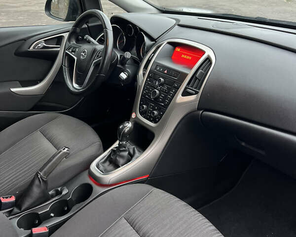 Черный Опель Астра, объемом двигателя 1.6 л и пробегом 174 тыс. км за 7500 $, фото 33 на Automoto.ua