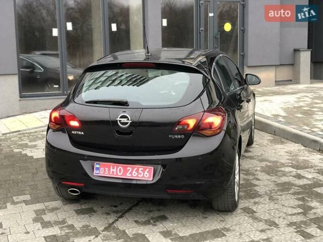 Черный Опель Астра, объемом двигателя 1.6 л и пробегом 138 тыс. км за 8990 $, фото 17 на Automoto.ua