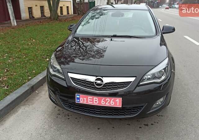 Черный Опель Астра, объемом двигателя 1.4 л и пробегом 157 тыс. км за 7200 $, фото 1 на Automoto.ua