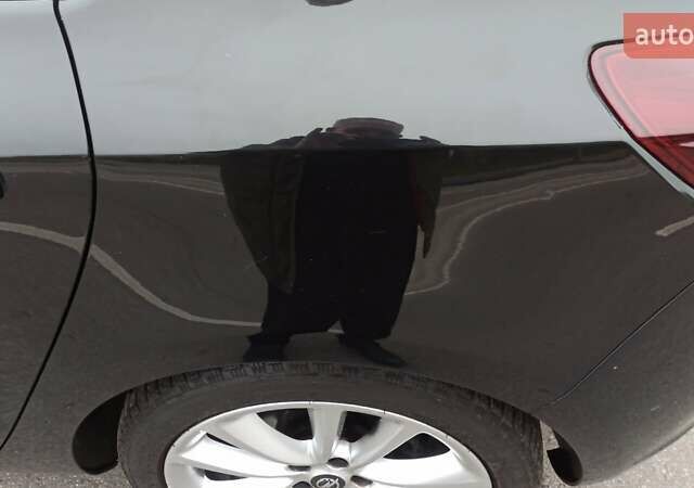 Черный Опель Астра, объемом двигателя 1.4 л и пробегом 157 тыс. км за 7200 $, фото 31 на Automoto.ua