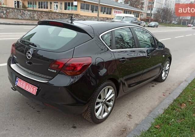 Черный Опель Астра, объемом двигателя 1.4 л и пробегом 157 тыс. км за 7200 $, фото 3 на Automoto.ua