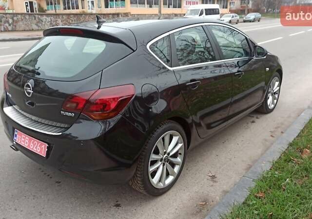 Черный Опель Астра, объемом двигателя 1.4 л и пробегом 157 тыс. км за 7200 $, фото 8 на Automoto.ua
