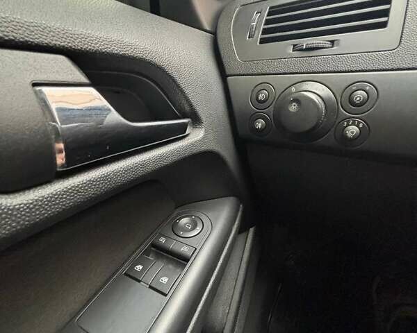 Черный Опель Астра, объемом двигателя 1.4 л и пробегом 218 тыс. км за 5700 $, фото 10 на Automoto.ua