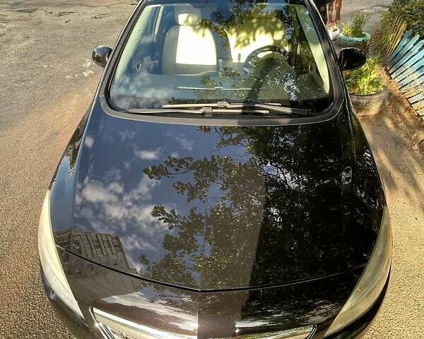 Чорний Опель Астра, об'ємом двигуна 1.69 л та пробігом 245 тис. км за 6300 $, фото 9 на Automoto.ua