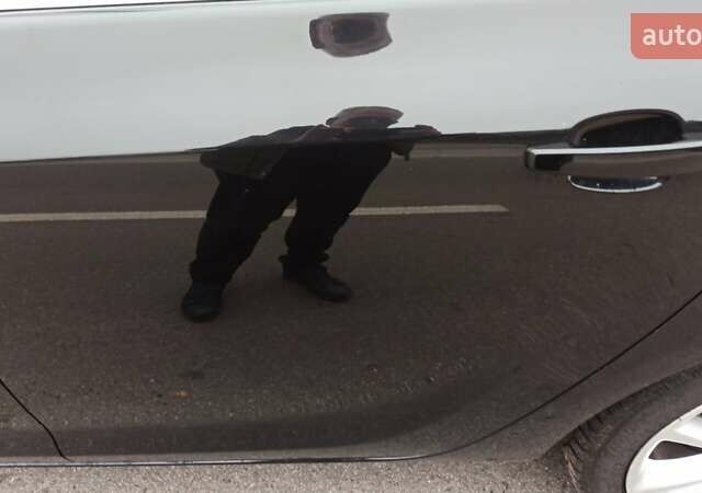 Черный Опель Астра, объемом двигателя 1.4 л и пробегом 157 тыс. км за 7200 $, фото 32 на Automoto.ua