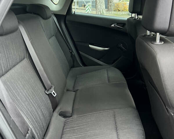 Черный Опель Астра, объемом двигателя 1.6 л и пробегом 174 тыс. км за 7500 $, фото 23 на Automoto.ua