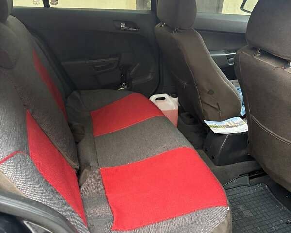 Черный Опель Астра, объемом двигателя 1.4 л и пробегом 218 тыс. км за 5700 $, фото 15 на Automoto.ua