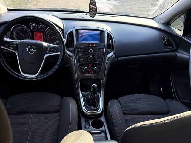 Чорний Опель Астра, об'ємом двигуна 1.2 л та пробігом 25 тис. км за 5600 $, фото 4 на Automoto.ua