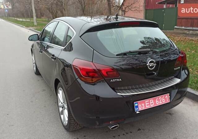 Черный Опель Астра, объемом двигателя 1.4 л и пробегом 157 тыс. км за 7200 $, фото 23 на Automoto.ua