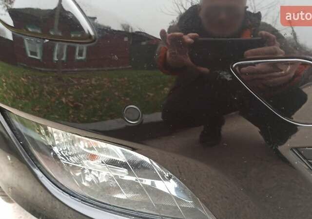 Черный Опель Астра, объемом двигателя 1.4 л и пробегом 157 тыс. км за 7200 $, фото 22 на Automoto.ua