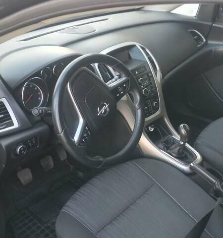 Черный Опель Астра, объемом двигателя 1.6 л и пробегом 210 тыс. км за 7500 $, фото 6 на Automoto.ua