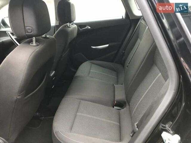 Черный Опель Астра, объемом двигателя 1.6 л и пробегом 138 тыс. км за 8990 $, фото 35 на Automoto.ua