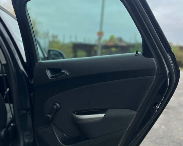 Черный Опель Астра, объемом двигателя 1.6 л и пробегом 174 тыс. км за 7500 $, фото 22 на Automoto.ua