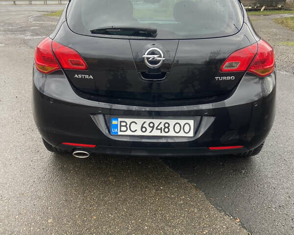 Черный Опель Астра, объемом двигателя 1.4 л и пробегом 155 тыс. км за 6499 $, фото 4 на Automoto.ua