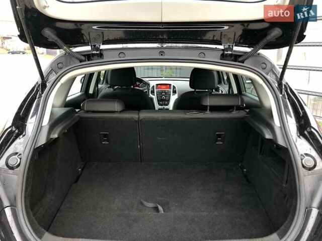 Черный Опель Астра, объемом двигателя 1.6 л и пробегом 138 тыс. км за 8990 $, фото 29 на Automoto.ua