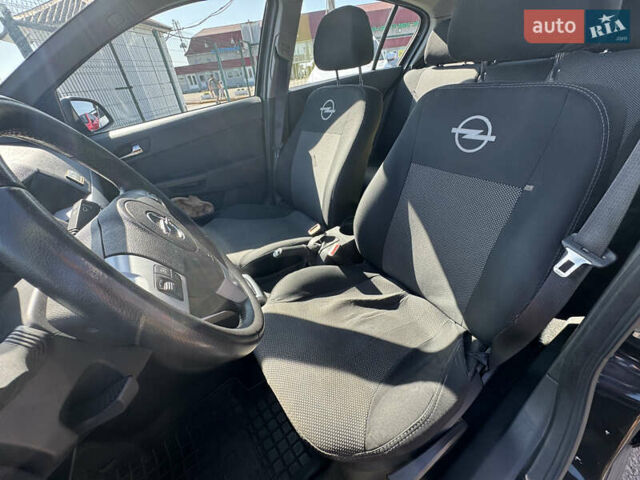 Черный Опель Астра, объемом двигателя 1.6 л и пробегом 130 тыс. км за 6990 $, фото 16 на Automoto.ua