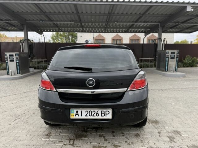 Черный Опель Астра, объемом двигателя 1.6 л и пробегом 169 тыс. км за 7000 $, фото 4 на Automoto.ua