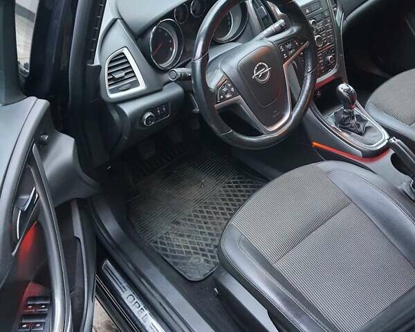 Черный Опель Астра, объемом двигателя 1.4 л и пробегом 134 тыс. км за 6800 $, фото 5 на Automoto.ua