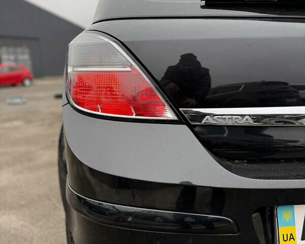 Черный Опель Астра, объемом двигателя 1.6 л и пробегом 169 тыс. км за 6750 $, фото 38 на Automoto.ua