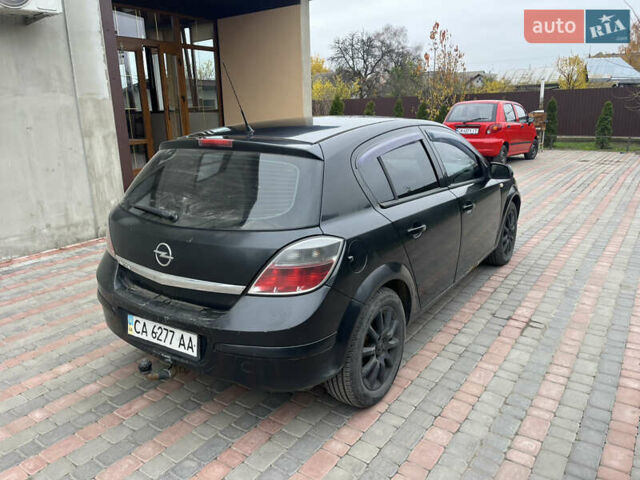 Черный Опель Астра, объемом двигателя 1.6 л и пробегом 125 тыс. км за 5000 $, фото 3 на Automoto.ua