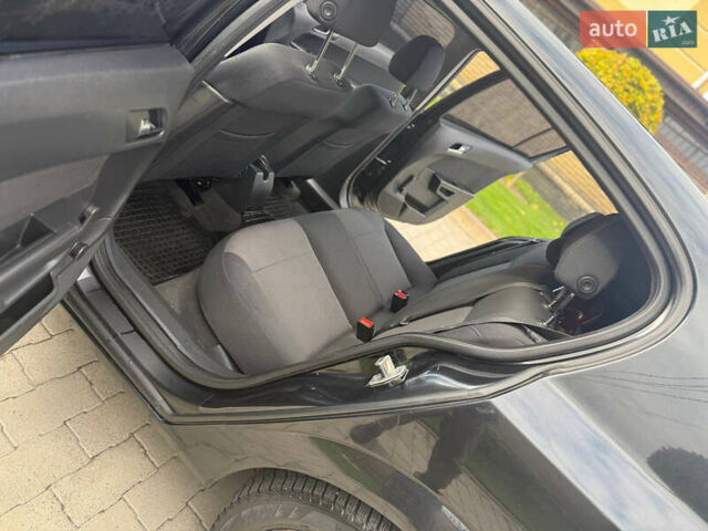 Черный Опель Астра, объемом двигателя 1.6 л и пробегом 169 тыс. км за 7250 $, фото 41 на Automoto.ua