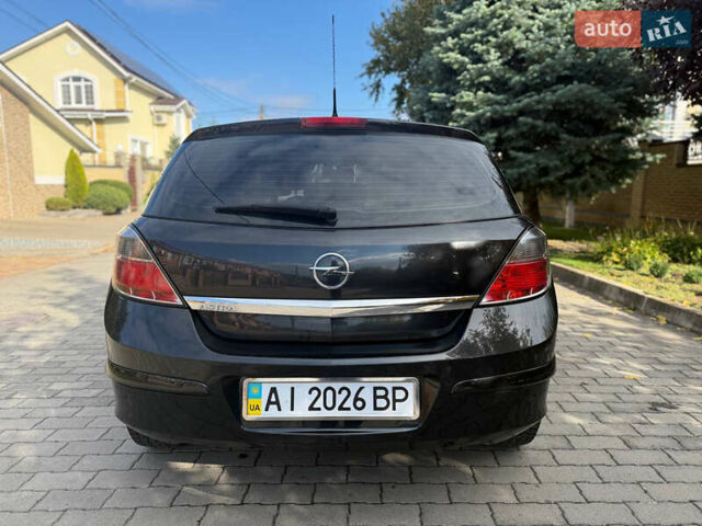 Черный Опель Астра, объемом двигателя 1.6 л и пробегом 169 тыс. км за 7250 $, фото 3 на Automoto.ua