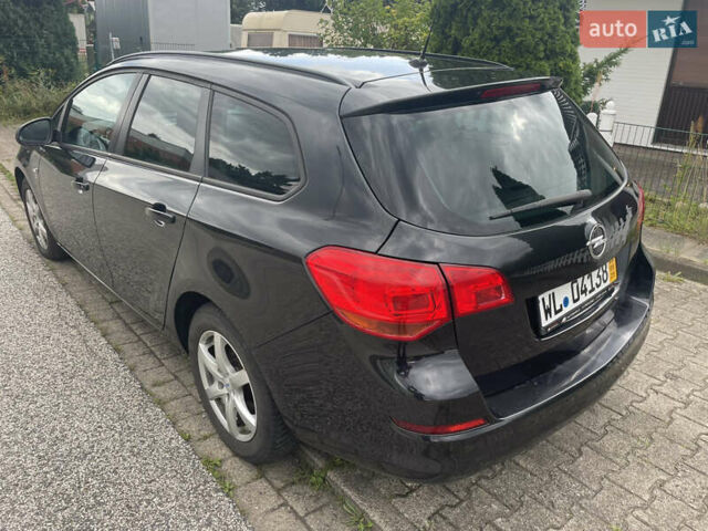 Черный Опель Астра, объемом двигателя 1.7 л и пробегом 222 тыс. км за 5600 $, фото 5 на Automoto.ua