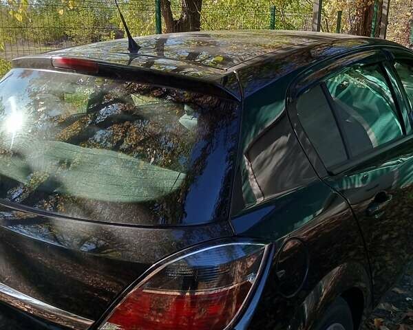 Черный Опель Астра, объемом двигателя 1.6 л и пробегом 140 тыс. км за 6100 $, фото 13 на Automoto.ua
