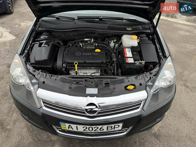 Черный Опель Астра, объемом двигателя 1.6 л и пробегом 169 тыс. км за 6750 $, фото 33 на Automoto.ua