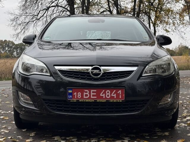 Чорний Опель Астра, об'ємом двигуна 1.4 л та пробігом 124 тис. км за 8607 $, фото 1 на Automoto.ua