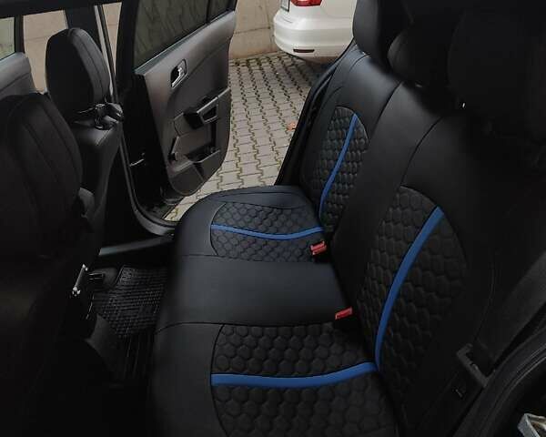 Черный Опель Астра, объемом двигателя 1.6 л и пробегом 102 тыс. км за 6700 $, фото 9 на Automoto.ua